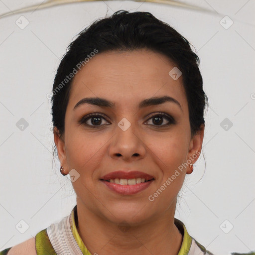 Joyful latino young-adult female with short  black hair and brown eyes