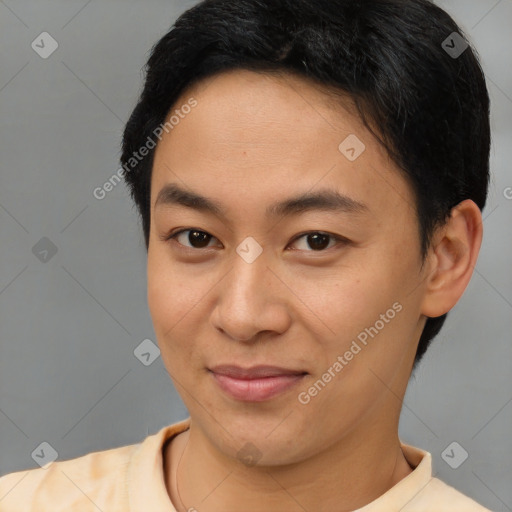 Joyful latino young-adult male with short  brown hair and brown eyes