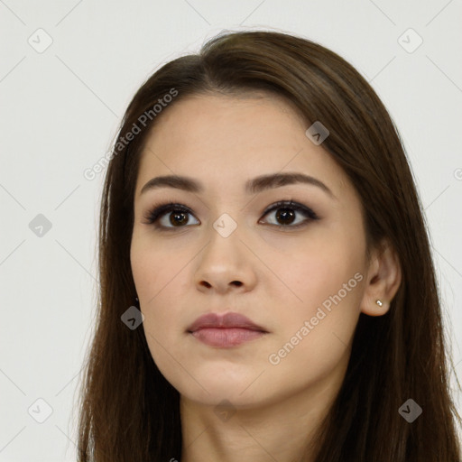 Neutral white young-adult female with long  brown hair and brown eyes