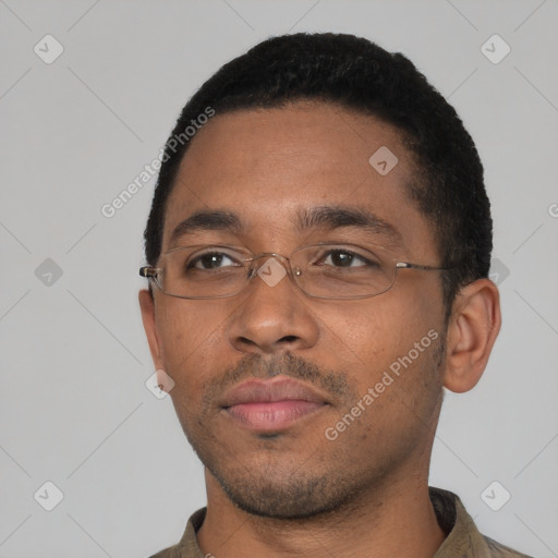 Neutral black young-adult male with short  black hair and brown eyes