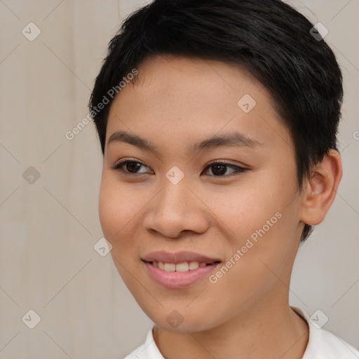 Joyful asian young-adult female with short  brown hair and brown eyes