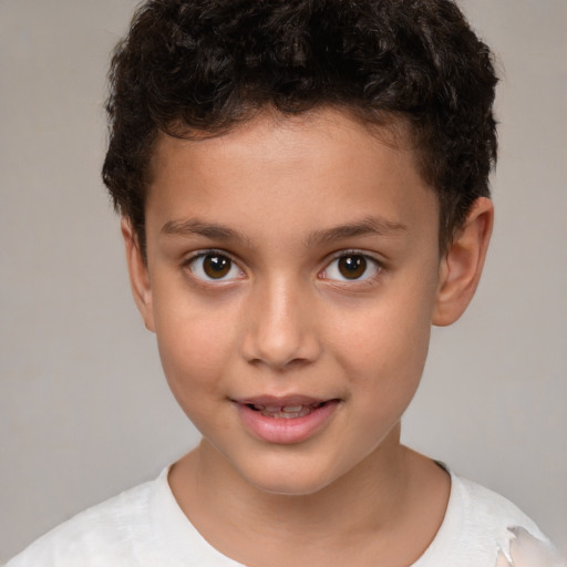 Joyful white child male with short  brown hair and brown eyes