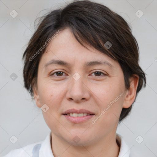 Joyful white adult female with medium  brown hair and brown eyes