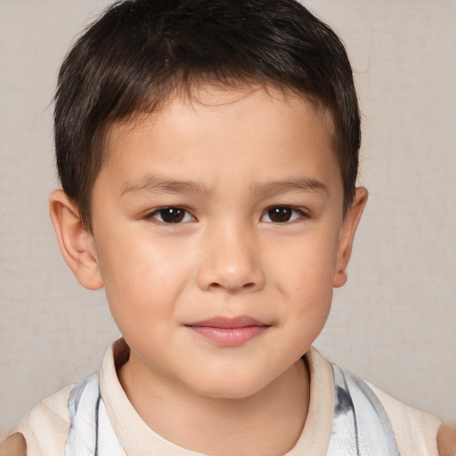 Joyful white child male with short  brown hair and brown eyes