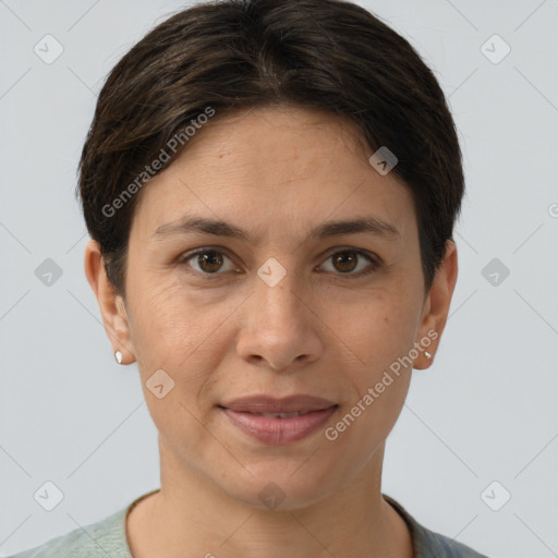 Joyful white adult female with short  brown hair and brown eyes