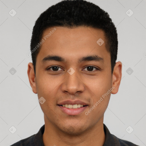 Joyful latino young-adult male with short  brown hair and brown eyes