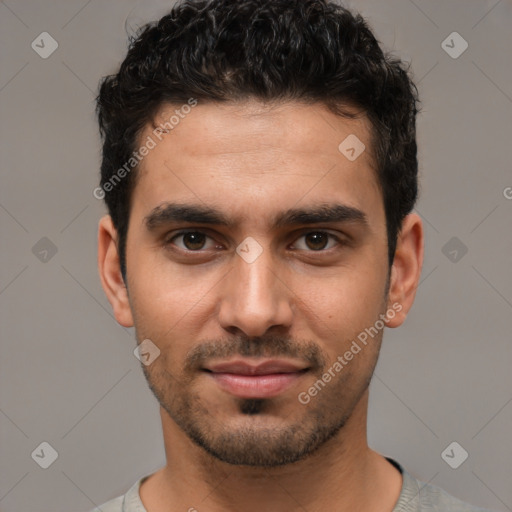 Joyful white young-adult male with short  black hair and brown eyes