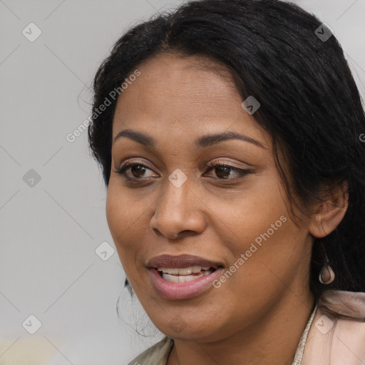 Joyful latino young-adult female with long  brown hair and brown eyes