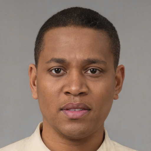 Neutral latino young-adult male with short  brown hair and brown eyes