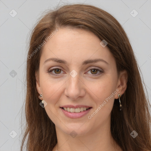 Joyful white young-adult female with long  brown hair and grey eyes