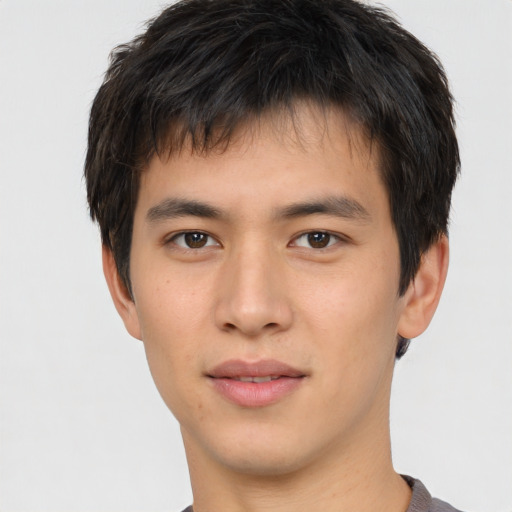 Neutral asian young-adult male with short  brown hair and brown eyes