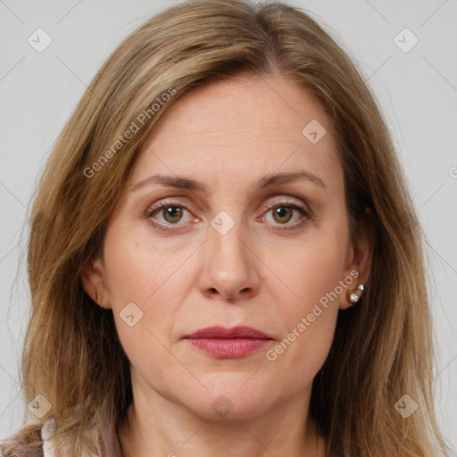 Joyful white adult female with medium  brown hair and grey eyes