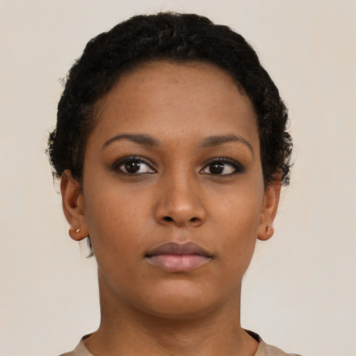 Neutral black young-adult female with short  brown hair and brown eyes