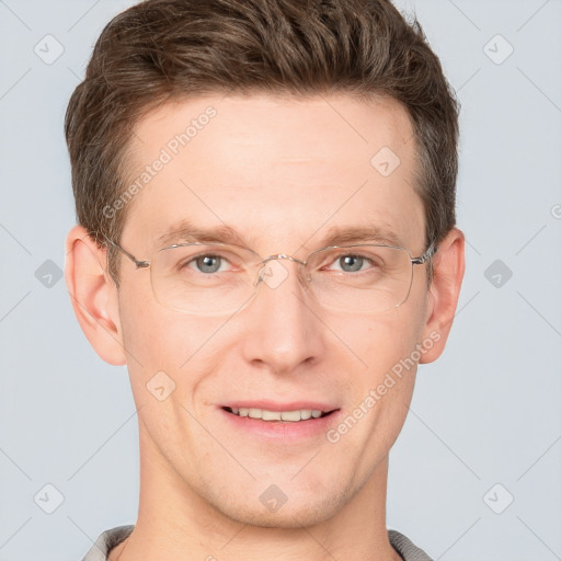 Joyful white adult male with short  brown hair and grey eyes