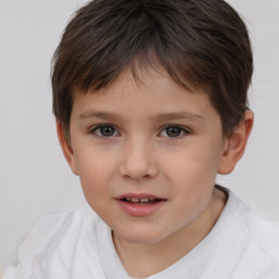 Joyful white child female with short  brown hair and brown eyes