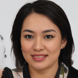 Joyful asian young-adult female with medium  brown hair and brown eyes