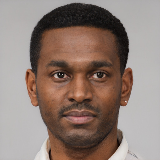Neutral black young-adult male with short  black hair and brown eyes