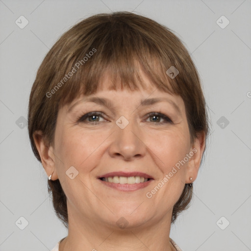 Joyful white adult female with medium  brown hair and grey eyes