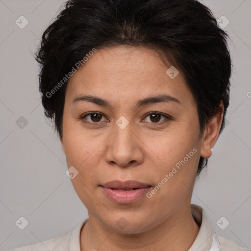 Joyful white adult female with short  brown hair and brown eyes