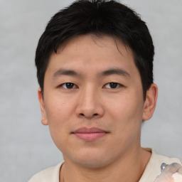 Neutral asian young-adult male with short  brown hair and brown eyes