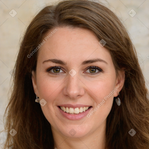 Joyful white young-adult female with long  brown hair and green eyes