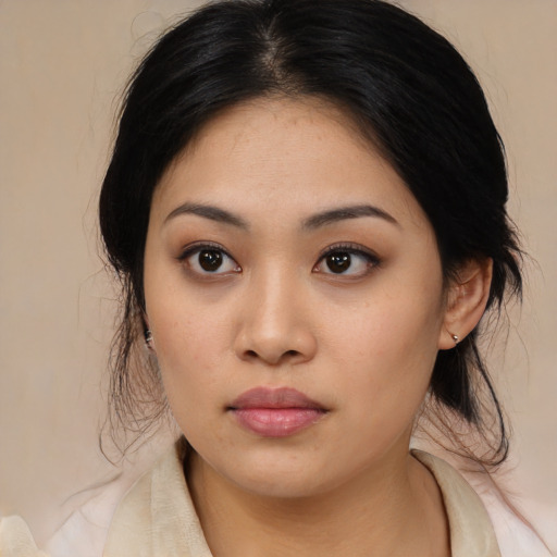 Neutral asian young-adult female with medium  black hair and brown eyes