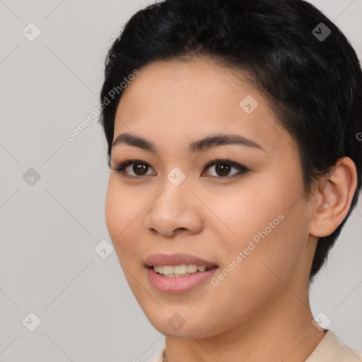 Joyful asian young-adult female with short  black hair and brown eyes