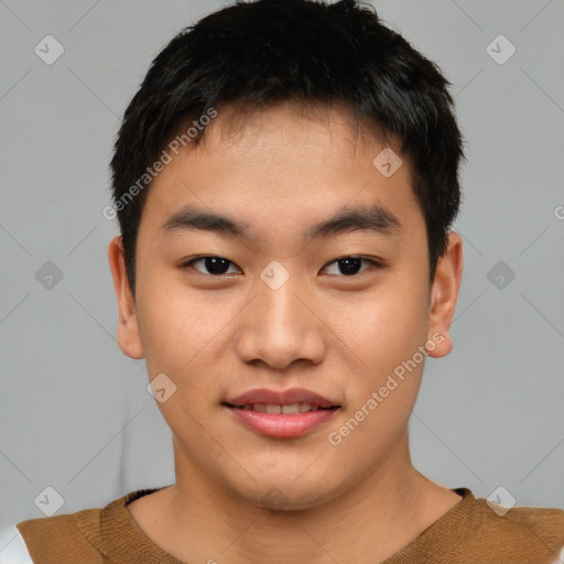 Joyful asian young-adult male with short  brown hair and brown eyes