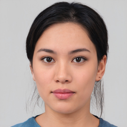 Neutral asian young-adult female with medium  black hair and brown eyes