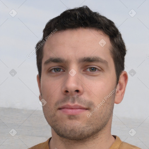 Neutral white young-adult male with short  brown hair and brown eyes