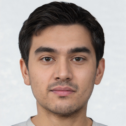 Neutral white young-adult male with short  black hair and brown eyes