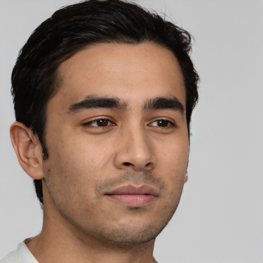 Neutral latino young-adult male with short  brown hair and brown eyes