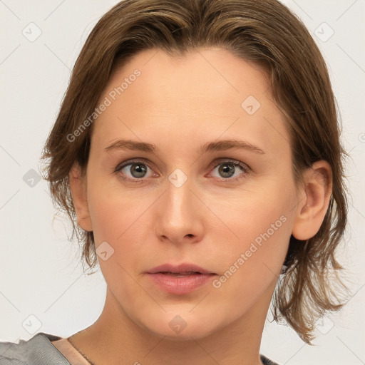 Neutral white young-adult female with medium  brown hair and grey eyes