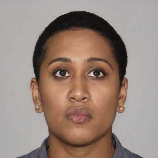 Neutral black young-adult female with short  black hair and brown eyes