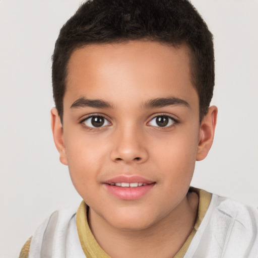 Joyful white child male with short  brown hair and brown eyes