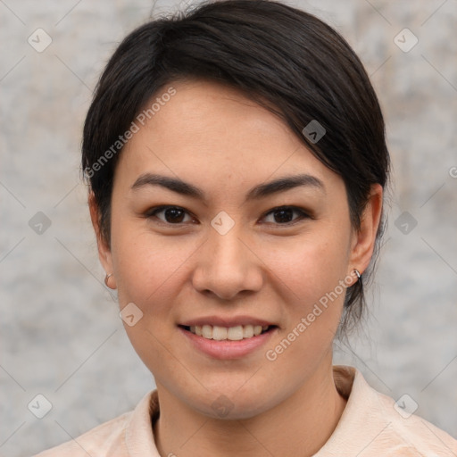 Joyful asian young-adult female with short  brown hair and brown eyes