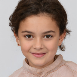 Joyful white child female with short  brown hair and brown eyes