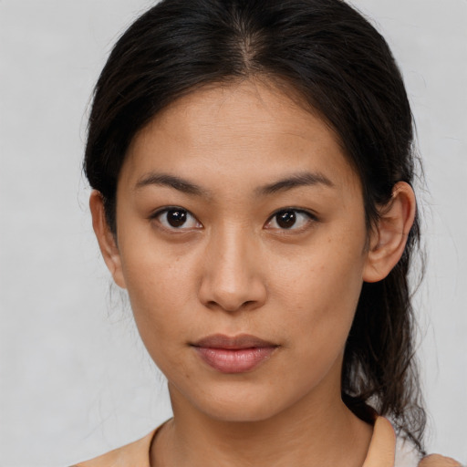 Neutral latino young-adult female with medium  brown hair and brown eyes