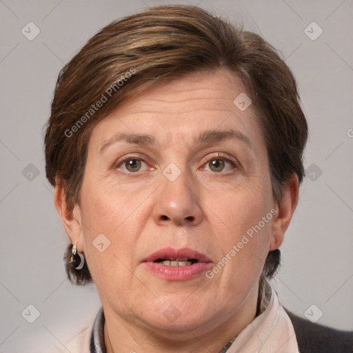 Joyful white adult female with medium  brown hair and grey eyes