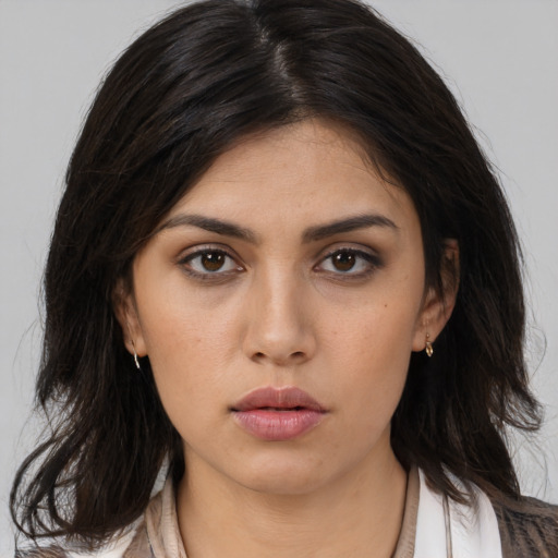 Neutral asian young-adult female with medium  brown hair and brown eyes