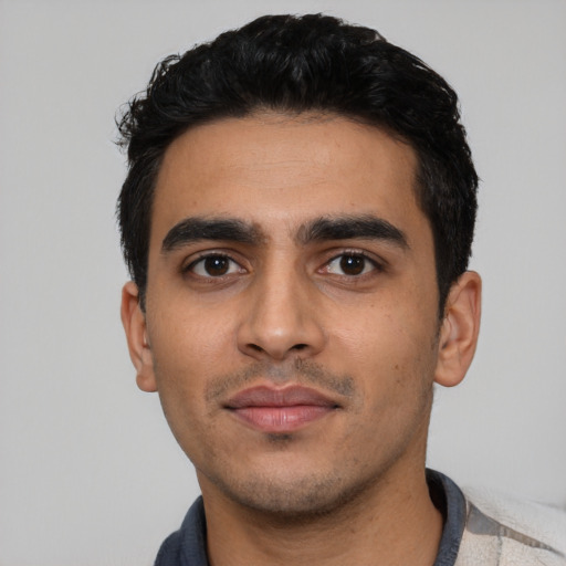 Neutral latino young-adult male with short  black hair and brown eyes