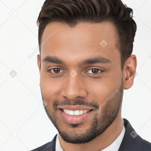 Joyful white young-adult male with short  brown hair and brown eyes