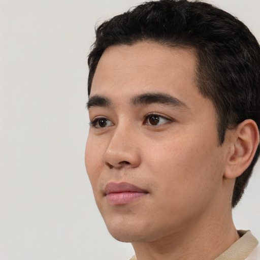 Neutral white young-adult male with short  black hair and brown eyes
