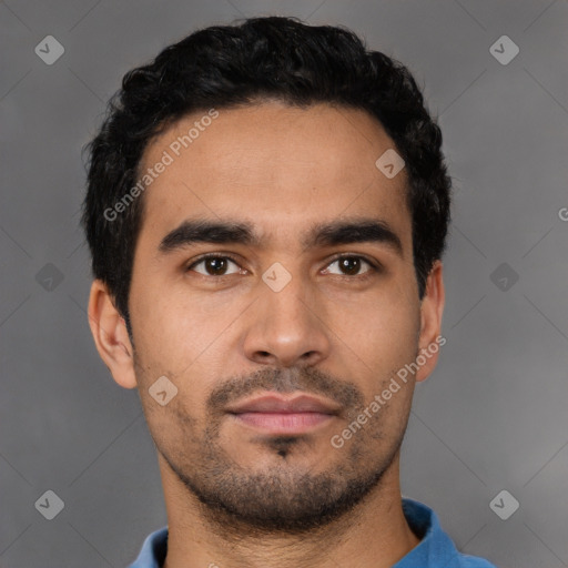 Neutral latino young-adult male with short  black hair and brown eyes
