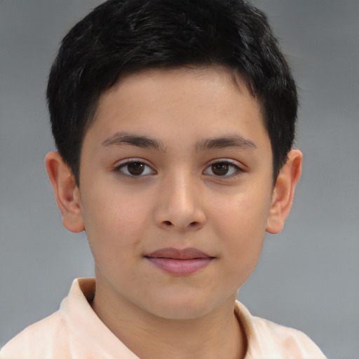 Joyful white child male with short  brown hair and brown eyes