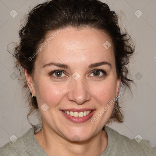 Joyful white adult female with medium  brown hair and blue eyes