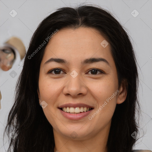 Joyful asian young-adult female with long  brown hair and brown eyes