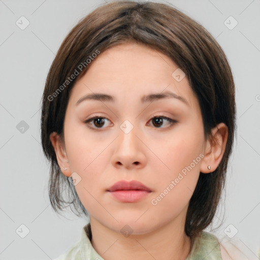 Neutral white young-adult female with medium  brown hair and brown eyes