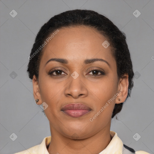 Joyful latino young-adult female with short  black hair and brown eyes