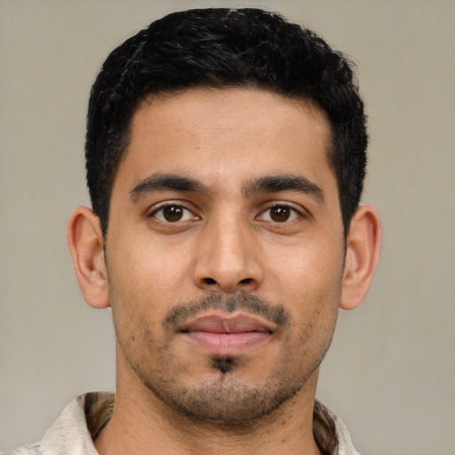 Neutral latino young-adult male with short  black hair and brown eyes